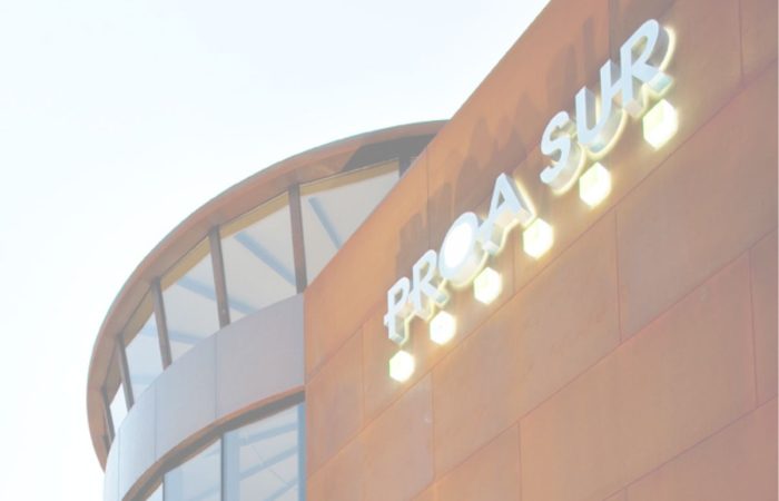 Fachada de la sede de Proasur en Olloniego con el logo original de la empresa